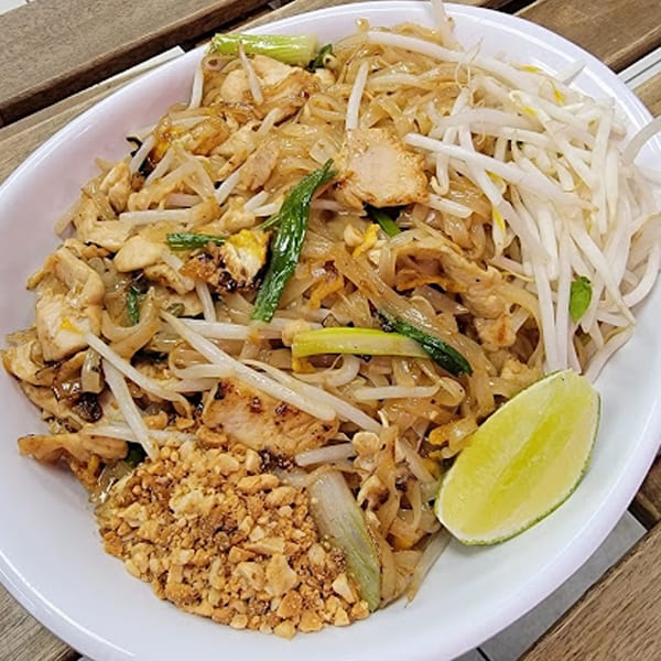 Kao Sarn Thai Street Food's Pad Thai with chicken, bean sprouts, crushed peanuts, and lime.